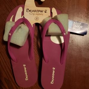 Hot pink bearpaw flip flops